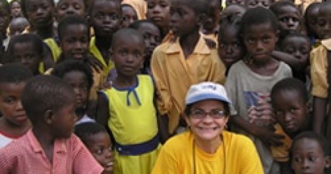 With the children of the village of Adarkwa in Suhum, West Ghana during our concert choir tour 2006